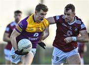 7 January 2023; Liam Doyle of Wexford in action against Jamie Gonoud of Westmeath during the O'Byrne Cup Group A Round 2 match between Westmeath and Wexford at The Downs GAA club in Mullingar, Westmeath. Photo by Sam Barnes/Sportsfile