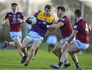 7 January 2023; Liam Doyle of Wexford in action against, from left, David Giles, Nigel Harte and Jamie Gonoud of Westmeath during the O'Byrne Cup Group A Round 2 match between Westmeath and Wexford at The Downs GAA club in Mullingar, Westmeath. Photo by Sam Barnes/Sportsfile