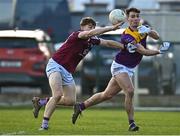 7 January 2023; Robbie Brooks of Wexford in action against David Giles of Westmeath during the O'Byrne Cup Group A Round 2 match between Westmeath and Wexford at The Downs GAA club in Mullingar, Westmeath. Photo by Sam Barnes/Sportsfile