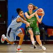 7 January 2023; Mireia Riera of Trinity Meteors in action against Tyra Johnson of DCU Mercy during the Basketball Ireland Paudie O'Connor Cup Semi-Final match between DCU Mercy and Trinity Meteors at Neptune Stadium in Cork. Photo by Brendan Moran/Sportsfile