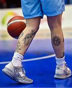 7 January 2023; Tattoos on the legs on Lindsey Abed of DCU Mercy during the Basketball Ireland Paudie O'Connor Cup Semi-Final match between DCU Mercy and Trinity Meteors at Neptune Stadium in Cork. Photo by Brendan Moran/Sportsfile