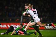 7 January 2023; Cathal Forde of Connacht on his way to scoring his side's second try, despite the tackle of Murray Koster of Cell C Sharks, during the United Rugby Championship match between Connacht and Cell C Sharks at the Sportsground in Galway. Photo by Eóin Noonan/Sportsfile
