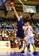 7 January 2023; Neil Lynch of DBS Éanna in action against Ronan O'Sullivan of Emporium Cork Basketball during the Basketball Ireland Pat Duffy Cup Semi-Final match between DCU Mercy and Trinity Meteors at Neptune Stadium in Cork. Photo by Brendan Moran/Sportsfile