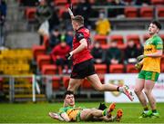 8 January 2023; Liam Kerr of Down celebrates after scoring his side's first goal as Jamie Grant of Donegal reacts during the Bank of Ireland Dr McKenna Cup Round 2 match between Down and Donegal at Pairc Esler in Newry, Down. Photo by Harry Murphy/Sportsfile