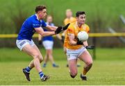 8 January 2023; Oisin Lenehan of Antrim in action against Ciarán Brady of Cavan during the Bank of Ireland Dr McKenna Cup Round 2 match between Antrim and Cavan at Kelly Park in Portglenone, Antrim. Photo by Ramsey Cardy/Sportsfile