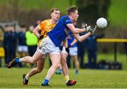 8 January 2023; Enda Maguire of Cavan in action against Dominic McEnhill of Antrim during the Bank of Ireland Dr McKenna Cup Round 2 match between Antrim and Cavan at Kelly Park in Portglenone, Antrim. Photo by Ramsey Cardy/Sportsfile