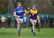 8 January 2023; Patrick Purcell of Laois in action against Charlie McGuckin of Wexford during the Walsh Cup Group 2 Round 1 match between Laois and Wexford at St Fintan's GAA Grounds in Mountrath, Laois. Photo by Seb Daly/Sportsfile