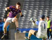 8 January 2023; Hugh Kenny of Kilmacud Crokes in action against Kerins O'Rahilly's goalkeeper Shane Foley during the AIB GAA Football All-Ireland Senior Club Championship Semi-Final match between Kilmacud Crokes of Dublin and Kerins O'Rahilly's of Kerry at Croke Park in Dublin. Photo by Ray McManus/Sportsfile