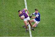 8 January 2023; Craig Dias of Kilmacud Crokes in action against Barry John Keane of Kerins O'Rahilly's during the AIB GAA Football All-Ireland Senior Club Championship Semi-Final match between Kilmacud Crokes of Dublin and Kerins O'Rahilly's of Kerry at Croke Park in Dublin. Photo by Daire Brennan/Sportsfile