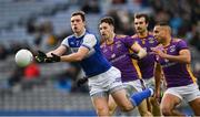 8 January 2023; David Moran of Kerins O'Rahilly's in action against Kilmacud Crokes players, from left, Aidan Jones, Ben Shovlin and Craig Dias  during the AIB GAA Football All-Ireland Senior Club Championship Semi-Final match between Kilmacud Crokes of Dublin and Kerins O'Rahilly's of Kerry at Croke Park in Dublin. Photo by Ray McManus/Sportsfile