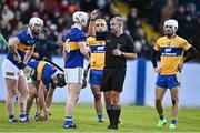 8 January 2023; Referee Eamonn Stapleton shows a black card to Bryan O'Mara of Tipperary, third from left, during the Co-Op Superstores Munster Hurling League Group 1 match between Tipperary and Clare at McDonagh Park in Nenagh, Tipperary. Photo by Sam Barnes/Sportsfile