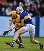 8 January 2023; David Conroy of Clare in action against Bryan O'Mara of Tipperary during the Co-Op Superstores Munster Hurling League Group 1 match between Tipperary and Clare at McDonagh Park in Nenagh, Tipperary. Photo by Sam Barnes/Sportsfile