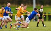 8 January 2023; John Cooke of Cavan in action against Dominic McEnhill of Antrim during the Bank of Ireland Dr McKenna Cup Round 2 match between Antrim and Cavan at Kelly Park in Portglenone, Antrim. Photo by Ramsey Cardy/Sportsfile