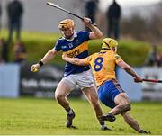 8 January 2023; Jake Morris of Tipperary in action against Paddy Donnellan of Clare during the Co-Op Superstores Munster Hurling League Group 1 match between Tipperary and Clare at McDonagh Park in Nenagh, Tipperary. Photo by Sam Barnes/Sportsfile