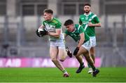 8 January 2023; Ethan Doherty of Glen in action against Seán Kelly of Moycullen during the AIB GAA Football All-Ireland Senior Club Championship Semi-Final match between Moycullen of Galway and Glen of Derry at Croke Park in Dublin. Photo by Daire Brennan/Sportsfile