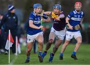 8 January 2023; Tomás Kayes of Laois in action against Charlie McGuckin of Wexford during the Walsh Cup Group 2 Round 1 match between Laois and Wexford at St Fintan's GAA Grounds in Mountrath, Laois. Photo by Seb Daly/Sportsfile