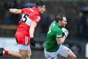 8 January 2023; Declan McCusker of Fermanagh in action against Conor Doherty of Derry during the Bank of Ireland Dr McKenna Cup Round 2 match between Fermanagh and Derry at Ederney St Josephs GAA Club in Ederney, Fermanagh. Photo by Oliver McVeigh/Sportsfile