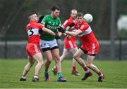 8 January 2023; Ryan Jones of Fermanagh in action against Niall Toner and Brendan Rogers of Derry during the Bank of Ireland Dr McKenna Cup Round 2 match between Fermanagh and Derry at Ederney St Josephs GAA Club in Ederney, Fermanagh. Photo by Oliver McVeigh/Sportsfile