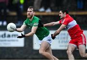 8 January 2023; Ultan Kelm of Fermanagh in action against Chrissy McKaigue of Derry  during the Bank of Ireland Dr McKenna Cup Round 2 match between Fermanagh and Derry at Ederney St Josephs GAA Club in Ederney, Fermanagh. Photo by Oliver McVeigh/Sportsfile