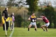 7 January 2023; Cormac Cooney of Wexford  in action against Kevin O'Sullivan of Westmeath during the O'Byrne Cup Group A Round 2 match between Westmeath and Wexford at The Downs GAA club in Mullingar, Westmeath. Photo by Sam Barnes/Sportsfile