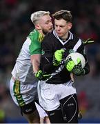 8 January 2023; Moycullen goalkeeper Andrew Power is tackled by Ryan Dougan of Glen during the AIB GAA Football All-Ireland Senior Club Championship Semi-Final match between Moycullen of Galway and Glen of Derry at Croke Park in Dublin. Photo by Ray McManus/Sportsfile