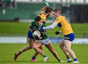 8 January 2023; Tony Brosnan of Kerry is tackled by Manus Doherty and Eoin Cleary of Clare during the McGrath Cup Group A match between Kerry and Clare at Austin Stack Park in Tralee, Kerry. Photo by Brendan Moran/Sportsfile