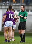 7 January 2023; Referee Kevin Williamson collects the match ball from Conor Carty of Wexford at half-time during the O'Byrne Cup Group A Round 2 match between Westmeath and Wexford at The Downs GAA club in Mullingar, Westmeath. Photo by Sam Barnes/Sportsfile