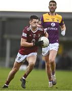 7 January 2023; Ronan O'Toole of Westmeath in action against Dean O'Toole of Wexford  during the O'Byrne Cup Group A Round 2 match between Westmeath and Wexford at The Downs GAA club in Mullingar, Westmeath. Photo by Sam Barnes/Sportsfile