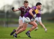 7 January 2023; Liam O'Connor of Wexford is tackled by John Heslin of Westmeath during the O'Byrne Cup Group A Round 2 match between Westmeath and Wexford at The Downs GAA club in Mullingar, Westmeath. Photo by Sam Barnes/Sportsfile