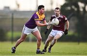 7 January 2023; Liam O'Connor of Wexford in action against Lorcan Dolan of Westmeath during the O'Byrne Cup Group A Round 2 match between Westmeath and Wexford at The Downs GAA club in Mullingar, Westmeath. Photo by Sam Barnes/Sportsfile