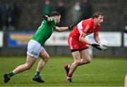 8 January 2023; Brendan Rogers of Derry in action against Conor McShea of Fermanagh during the Bank of Ireland Dr McKenna Cup Round 2 match between Fermanagh and Derry at Ederney St Josephs GAA Club in Ederney, Fermanagh. Photo by Oliver McVeigh/Sportsfile