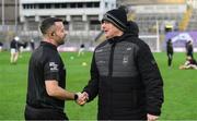 8 January 2023; Glen manager Malachy O'Rourke shakes hands with referee David Gough before the AIB GAA Football All-Ireland Senior Club Championship Semi-Final match between Moycullen of Galway and Glen of Derry at Croke Park in Dublin. Photo by Ray McManus/Sportsfile