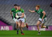 8 January 2023; Emmet Bradley of Glen in action against Peter Cooke, left, and Tom Clarke of Moycullen during the AIB GAA Football All-Ireland Senior Club Championship Semi-Final match between Moycullen of Galway and Glen of Derry at Croke Park in Dublin. Photo by Ray McManus/Sportsfile