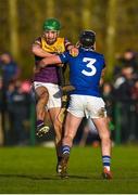 8 January 2023; Richie Lawlor of Wexford in action against Donnchadh Hartnett of Laois during the Walsh Cup Group 2 Round 1 match between Laois and Wexford at St Fintan's GAA Grounds in Mountrath, Laois. Photo by Seb Daly/Sportsfile