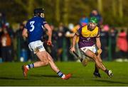 8 January 2023; Richie Lawlor of Wexford in action against Donnchadh Hartnett of Laois during the Walsh Cup Group 2 Round 1 match between Laois and Wexford at St Fintan's GAA Grounds in Mountrath, Laois. Photo by Seb Daly/Sportsfile