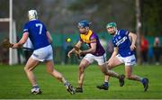 8 January 2023; Rory Higgins of Wexford in action against Ciaran Byrne of Laois, right, during the Walsh Cup Group 2 Round 1 match between Laois and Wexford at St Fintan's GAA Grounds in Mountrath, Laois. Photo by Seb Daly/Sportsfile