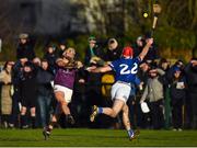 8 January 2023; Damien Reck of Wexford in action against Daniel Brennan of Laois during the Walsh Cup Group 2 Round 1 match between Laois and Wexford at St Fintan's GAA Grounds in Mountrath, Laois. Photo by Seb Daly/Sportsfile