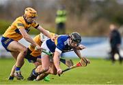 8 January 2023; Enda Heffernan of Tipperary in action against Aidan McCarthy, behind, and Robin Mounsey of Clare during the Co-Op Superstores Munster Hurling League Group 1 match between Tipperary and Clare at McDonagh Park in Nenagh, Tipperary. Photo by Sam Barnes/Sportsfile