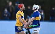 8 January 2023; Peter Duggan of Clare and Seamus Kennedy of Tipperary shake hands after the Co-Op Superstores Munster Hurling League Group 1 match between Tipperary and Clare at McDonagh Park in Nenagh, Tipperary. Photo by Sam Barnes/Sportsfile