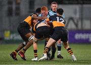10 January 2023; Scott Doran of Newpark Comprehensive School is tackled by Maksym Oshodi, left, James Sugrue, centre, and Cian Béhal Valle during the Bank of Ireland Vinnie Murray Cup First Round match between The King's Hospital and Newpark Comprehensive School at Energia Park in Dublin. Photo by Tyler Miller/Sportsfile