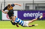 11 January 2023; Sam Farrar of Temple Carrig is tackled by Oran Kelleher of Ardscoil na Tríonóide during the Bank of Ireland Vinnie Murray Cup first round match between Ardscoil na Tríonóide and Temple Carrig School at Energia Park in Dublin. Photo by Harry Murphy/Sportsfile