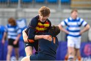 11 January 2023; Rhys Gamble of Temple Carrig, 11, celebrates with teammate Rhys Morgan after scoring his side's third try during the Bank of Ireland Vinnie Murray Cup first round match between Ardscoil na Tríonóide and Temple Carrig School at Energia Park in Dublin. Photo by Harry Murphy/Sportsfile