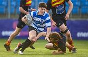 11 January 2023; Andrew Doyle of Ardscoil na Tríonóide is tackled by Sam Farrar of Temple Carrig during the Bank of Ireland Vinnie Murray Cup first round match between Ardscoil na Tríonóide and Temple Carrig School at Energia Park in Dublin. Photo by Harry Murphy/Sportsfile