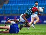 11 January 2023; Martin Sweeney of St Gerard’s School offloads as he is tackled by Charles Beck of St Andrew’s College during the Bank of Ireland Vinnie Murray Cup first round match between St Gerard’s School and St Andrew’s College at Energia Park in Dublin. Photo by Harry Murphy/Sportsfile