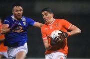 11 January 2023; Conor Moynagh of Cavan in action against Rory Grugan of Armagh during the Bank of Ireland Dr McKenna Cup Round 3 match between Cavan and Armagh at Kingspan Breffni in Cavan. Photo by Eóin Noonan/Sportsfile