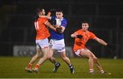 11 January 2023; Dara McVeety of Cavan is tackled by Callum Cumisky of Armagh during the Bank of Ireland Dr McKenna Cup Round 3 match between Cavan and Armagh at Kingspan Breffni in Cavan. Photo by Eóin Noonan/Sportsfile