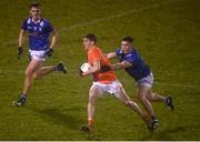 11 January 2023; Rory Grugan of Armagh is tackled by Dara McVeety of Cavan during the Bank of Ireland Dr McKenna Cup Round 3 match between Cavan and Armagh at Kingspan Breffni in Cavan. Photo by Eóin Noonan/Sportsfile