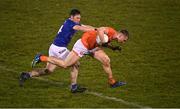 11 January 2023; Rian O'Neill of Armagh is tackled by Ryan O'Neill of Cavan during the Bank of Ireland Dr McKenna Cup Round 3 match between Cavan and Armagh at Kingspan Breffni in Cavan. Photo by Eóin Noonan/Sportsfile