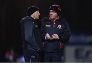 11 January 2023; Tyrone joint-managers Brian Dooher, left, and Feargal Logan during the Bank of Ireland Dr McKenna Cup Round 3 match between Derry and Tyrone at Derry GAA Centre of Excellence in Owenbeg, Derry. Photo by Ben McShane/Sportsfile