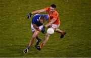 11 January 2023; David Brady of Cavan is tackled by Shane McPartland of Armagh during the Bank of Ireland Dr McKenna Cup Round 3 match between Cavan and Armagh at Kingspan Breffni in Cavan. Photo by Eóin Noonan/Sportsfile